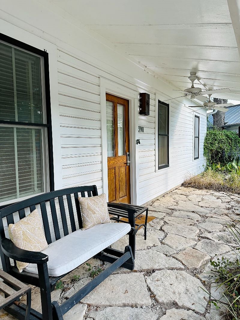 Front porch with seating area.