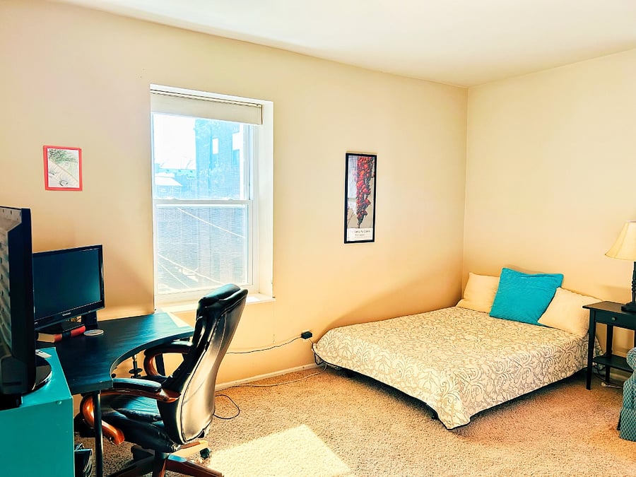 Third bedroom sunny window & full ergonomic desk set up and second screen / TV.