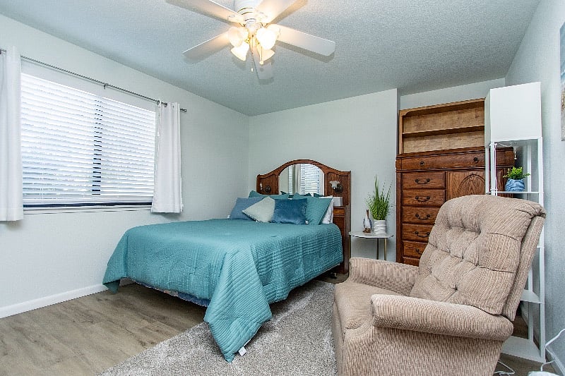 Bedroom Queen bed with room darkening curtains. Dresser , Lazy Boy recliners