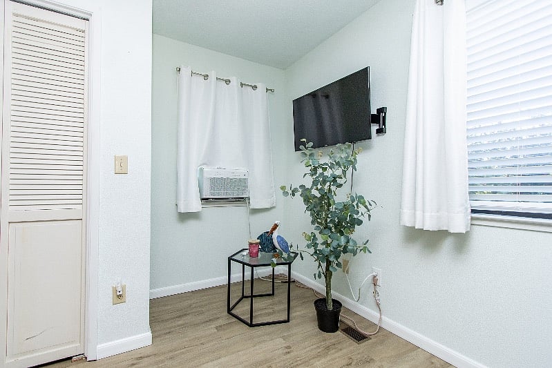 Bedroom. With adjustable wall Mount TV