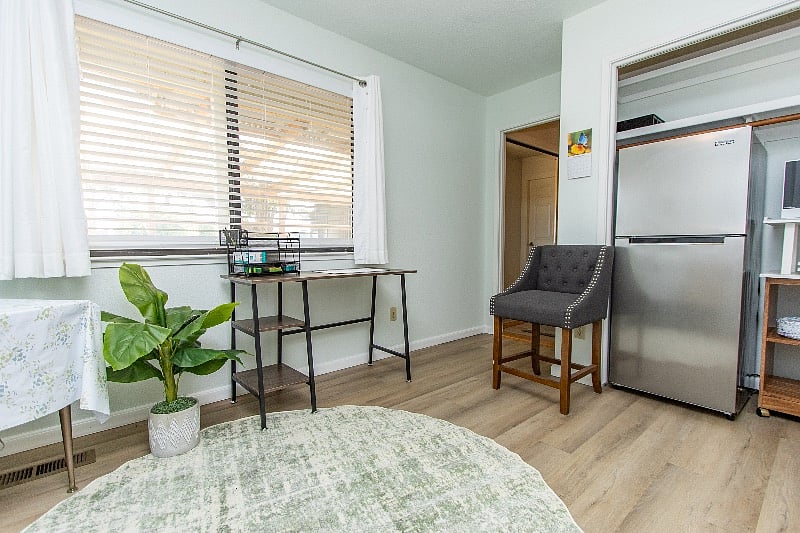 Kitchen.. includes a desk and Refrigerator,