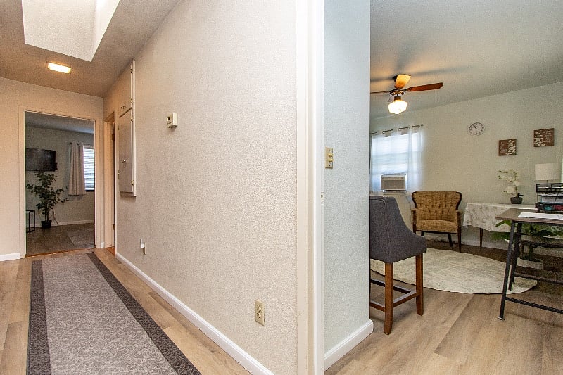 Hallway leading to kitchen, bathroom and bedroom