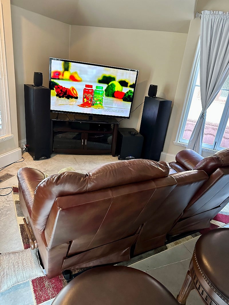 La-Z-boy Leather recliner, large screen smart TV with surround sound, Netflix, etc