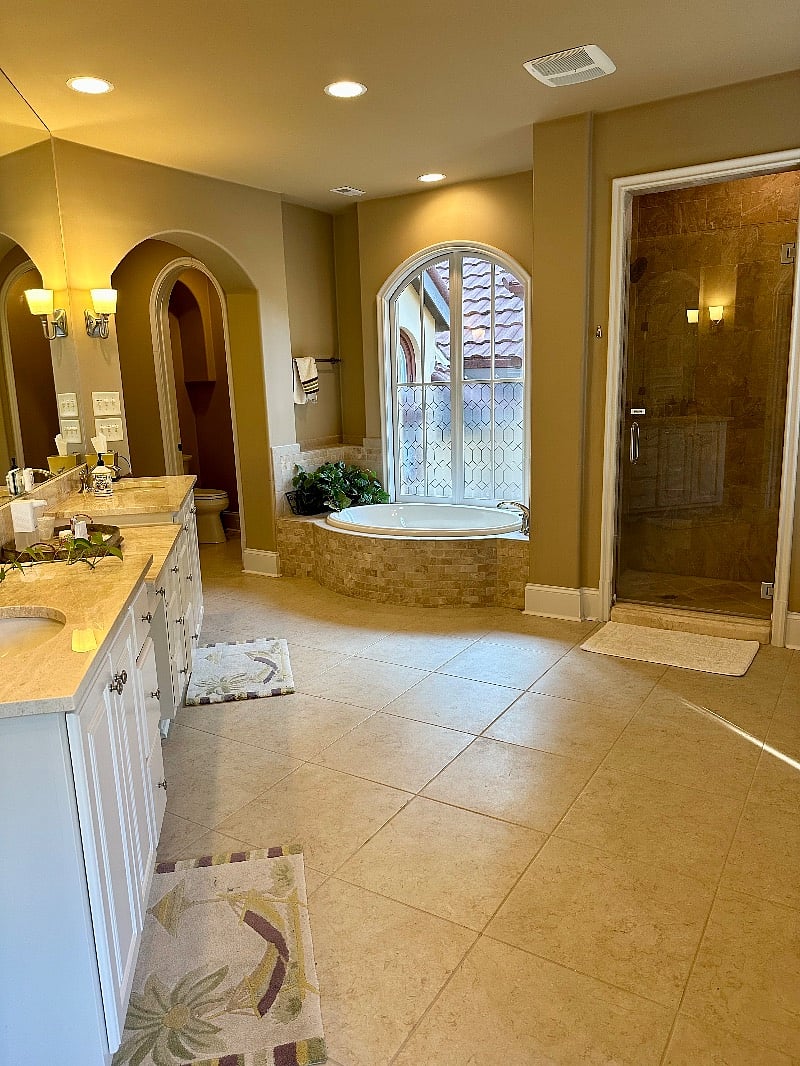 Huge bath with double vanity, jacuzzi style tub, separate shower, private water closet, second walk-in closet, and towels etc furnished.  