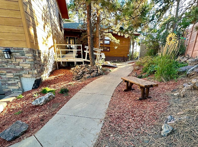Front entrance from driveway with handicap ramp.
