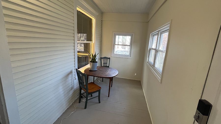 Front enclosed porch with Southeast sun.