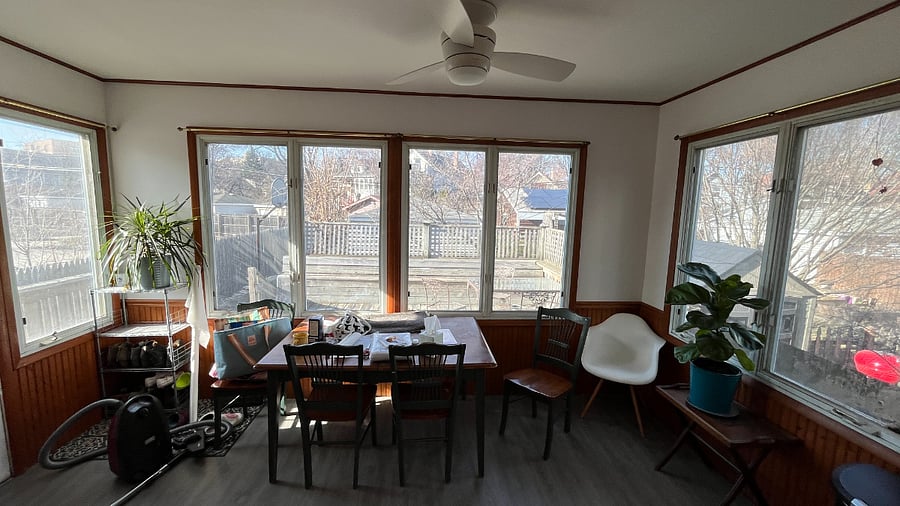 Sunroom eating area, great light, leading to large deck.