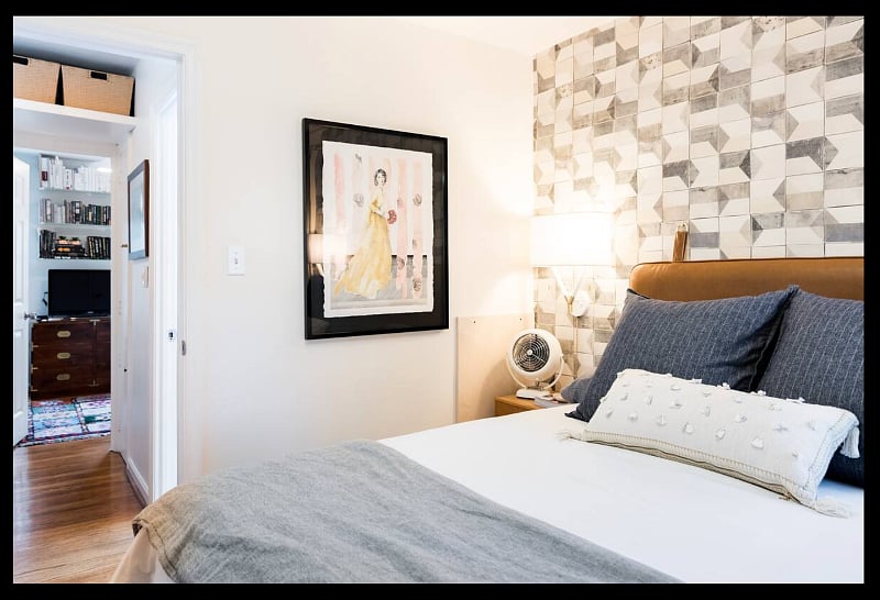 Primary bedroom w/ view of bedside lighting & side tables