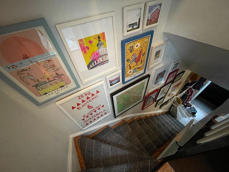 Gallery wall looking down stairs