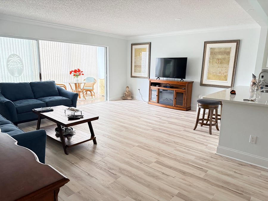 New LVP throughout the Condo, living room, kitchen entryway bedrooms, bathrooms