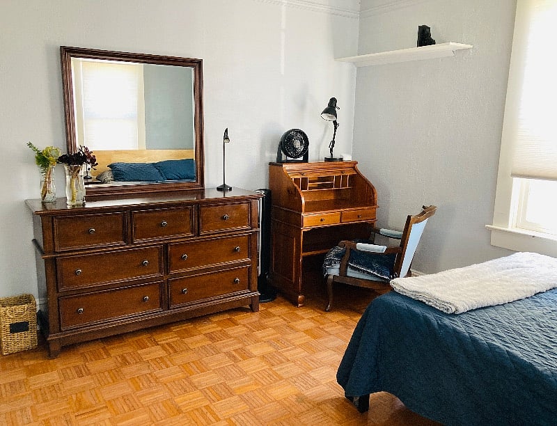 Dresser, mirror, desk, lamp, portable fan, floor heater