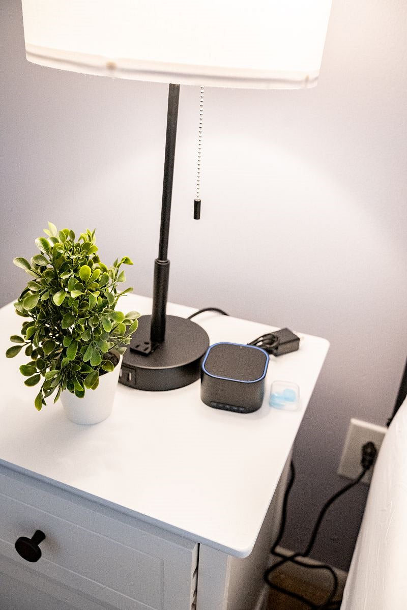 Complete with a sound machine and ear plugs for a peaceful night's sleep, our bedroom also features lamps with USB outlets and extra charging cords to cater to your electronic needs.