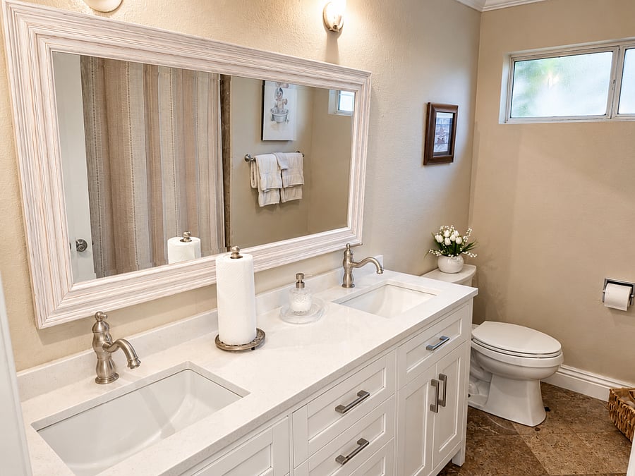 Private bathroom with double-sink vanity.