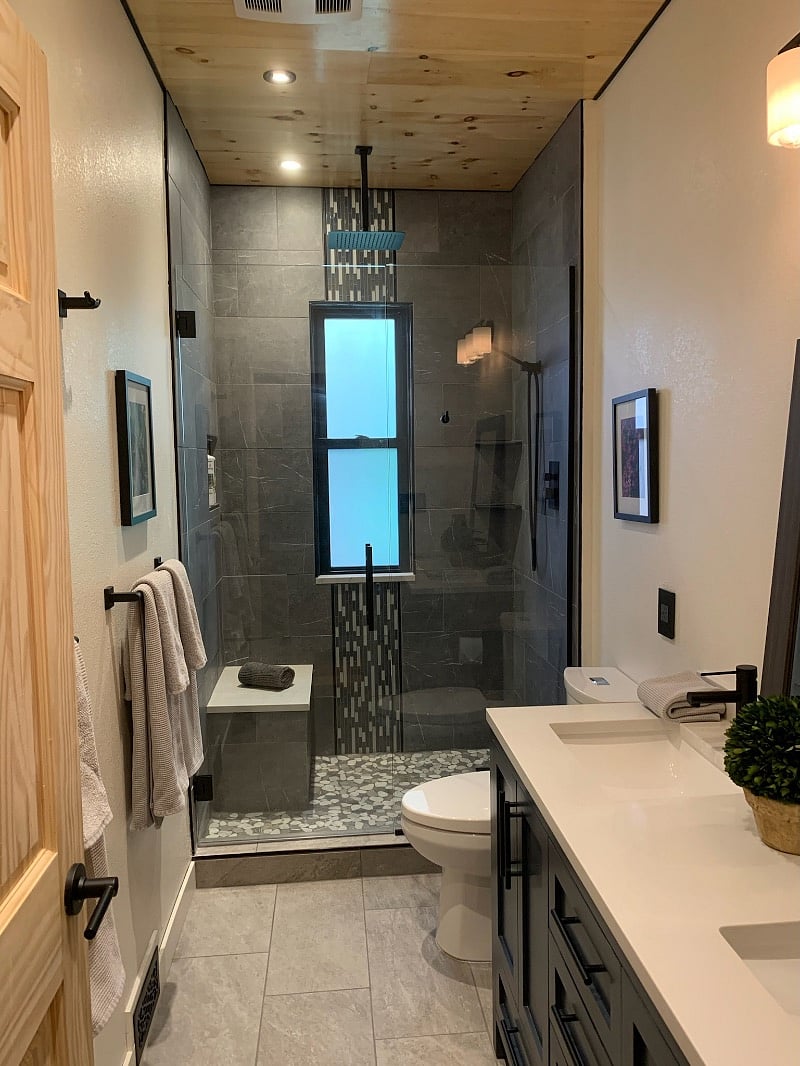 Newly remodeled bathroom with rainfall shower head. 