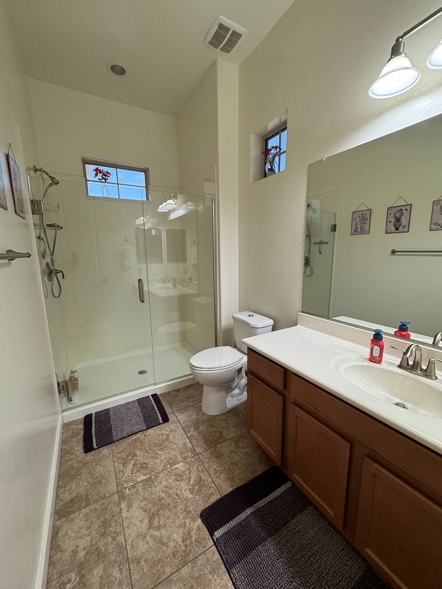 Bathroom with stand up shower. 