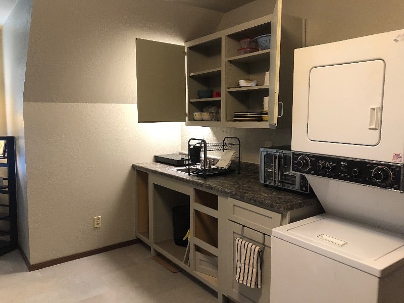 Dishes, pots and pans, utensils, kitchen linens provided.