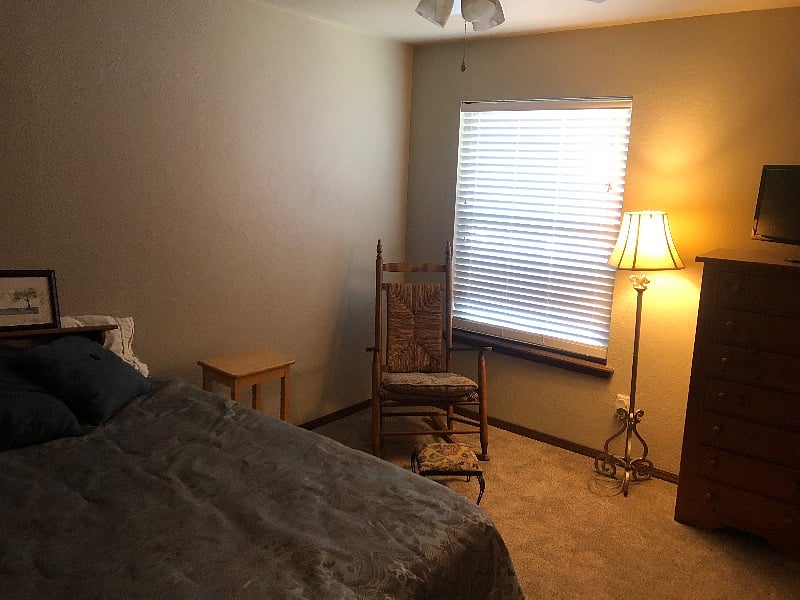 Bedroom 3--Full bed and chair overlooking the back yard. Desk and chair, chest and large closet with shelving.