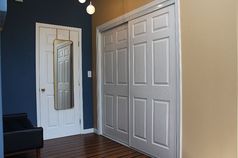 large closet and a full size mirror