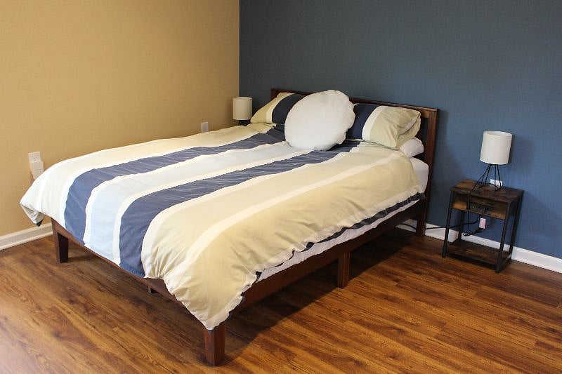 queen size bed with a new green tea cooling gel memory foam mattress and microfiber sheets
