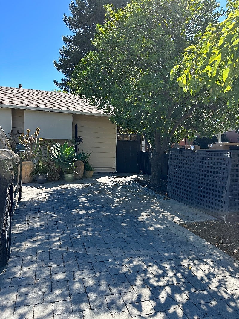Apartment entrance through side gate is completely separate from main house.