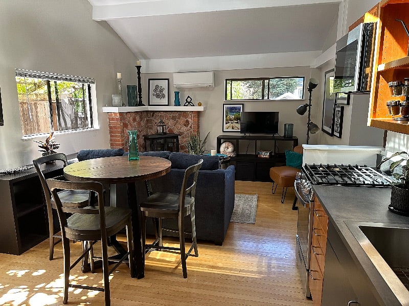 Spacious open living/dining/kitchen area with skylight, new, high efficient heating and air conditioning and remote control ceiling fan.
