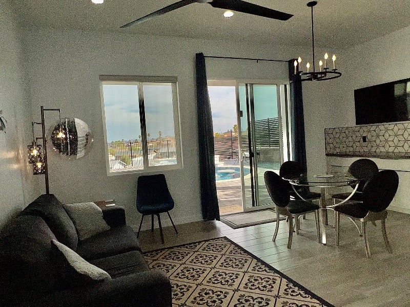 dining area and view of pool and mountains.