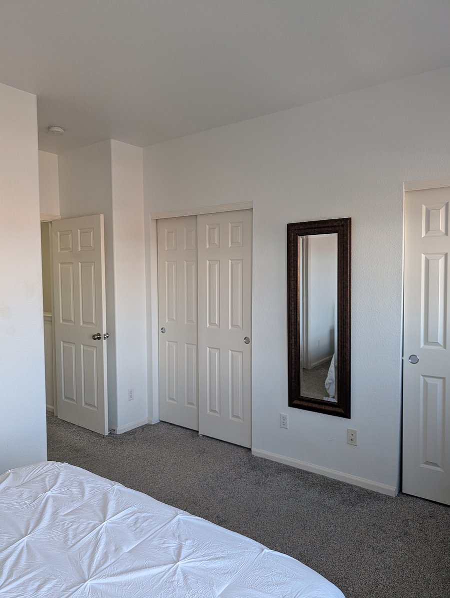 Master bedroom his and her closets 