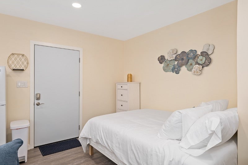 Queen bed. This is the back entrance to the property.