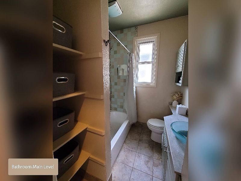 Shared Main Level Bathroom for Bedrooms One & Two - Great Storage!