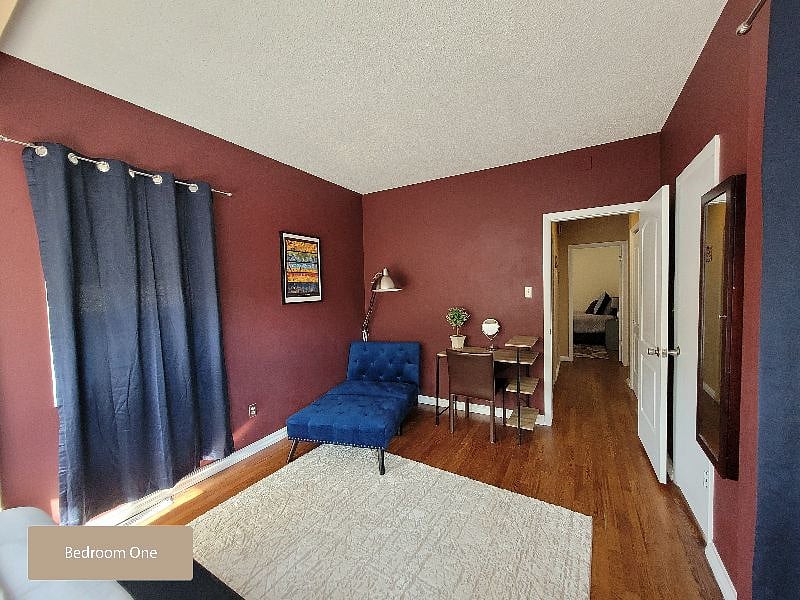Bedroom One - Vanity/Lounge/Workspace