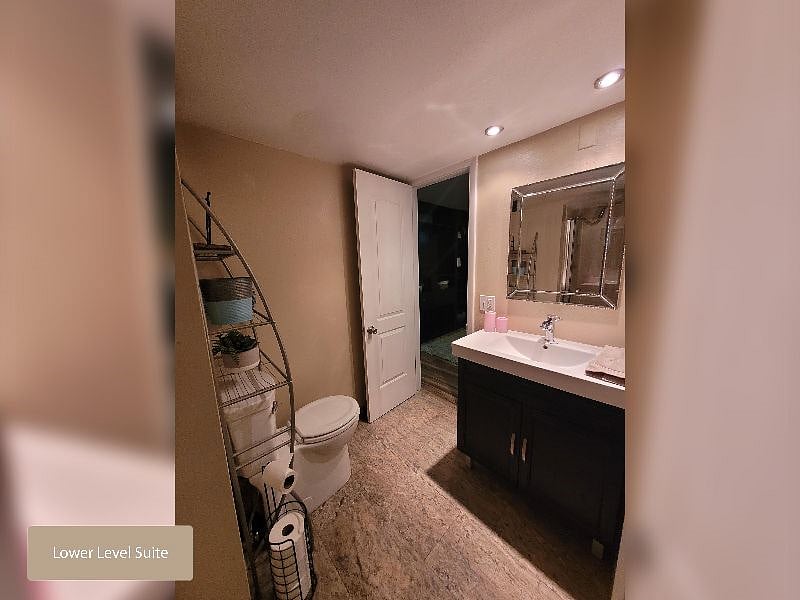 Lower Level Suite - Private Bathroom with entrances from the sleeping or lounge areas