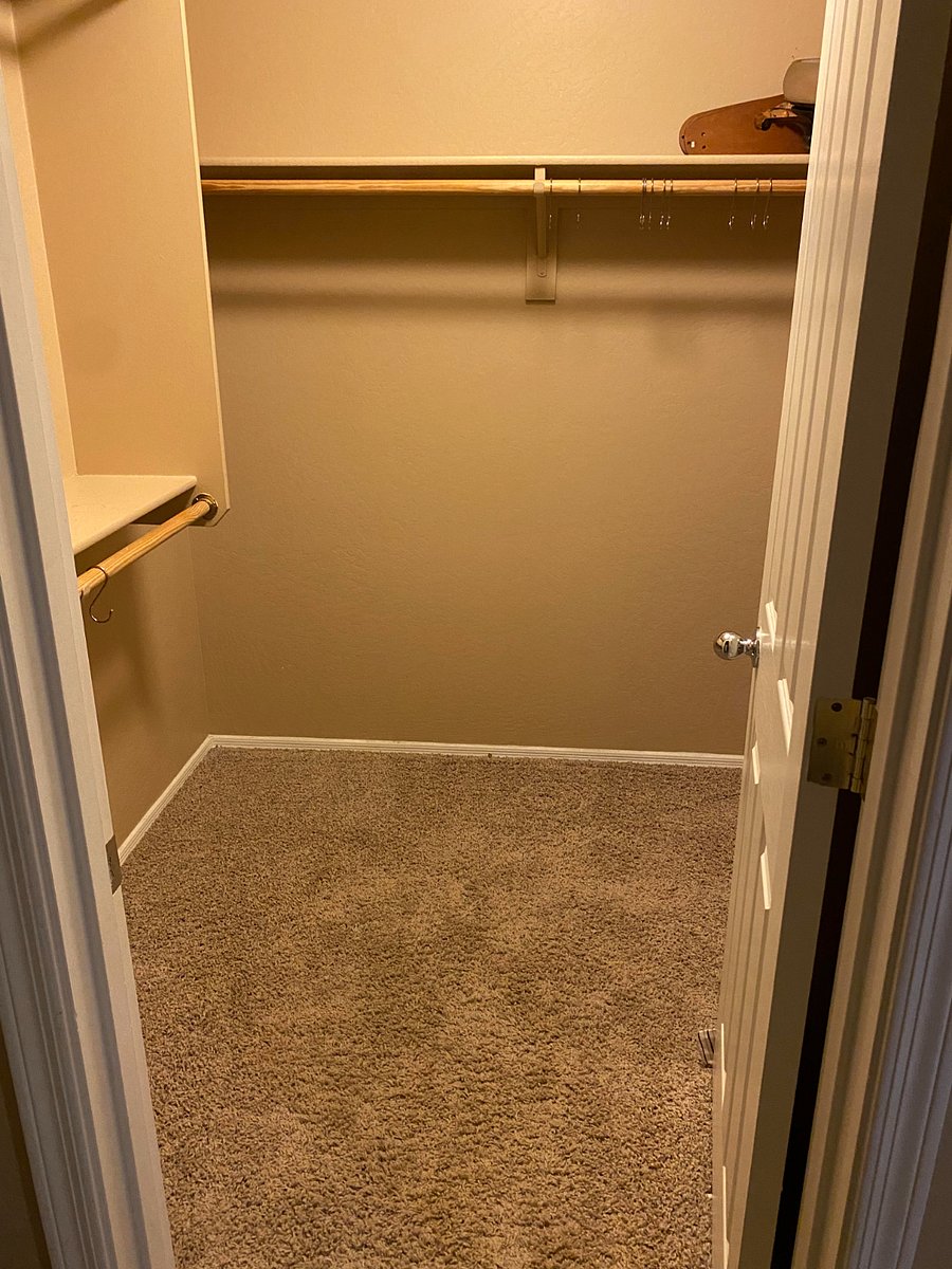 Large 3 sided walk-in closet
