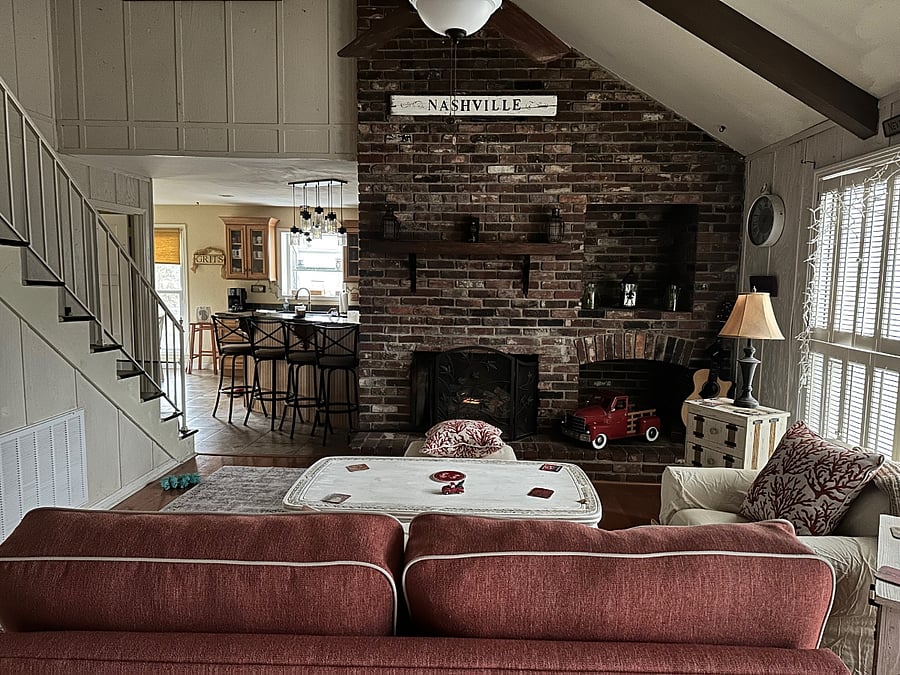 Den with view upstairs and into kitchen!