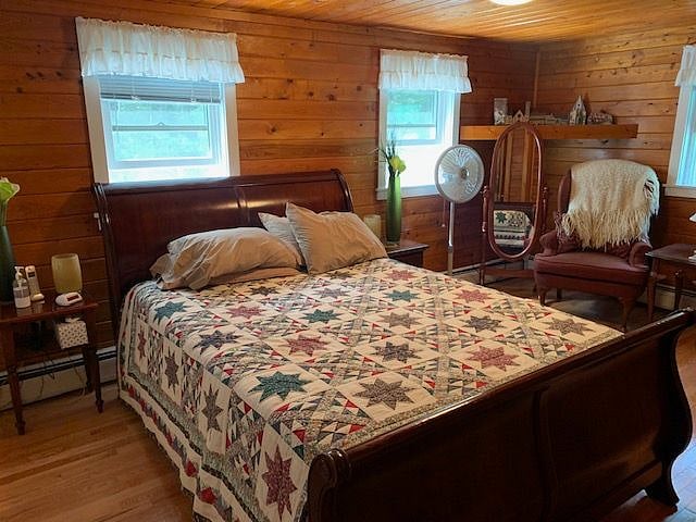 guest room with queen bed