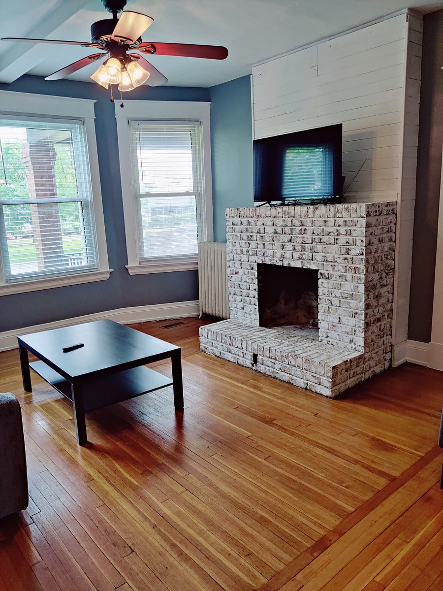 First floor apartment fireplace and TV