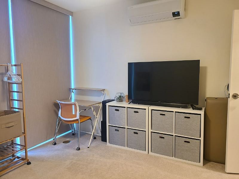 There is a Smart TV that has Netflix, Prime Video, Hulu, etc. and cubed drawers for extra storage space.