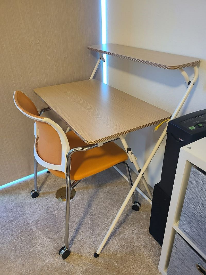 Desk has two levels for extra space and is foldable to create more space in the room, if needed.