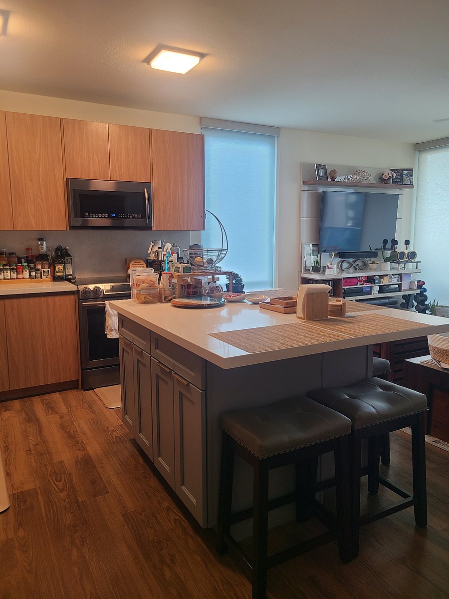 Here is the shared space - kitchen, living room and lanai (balcony).