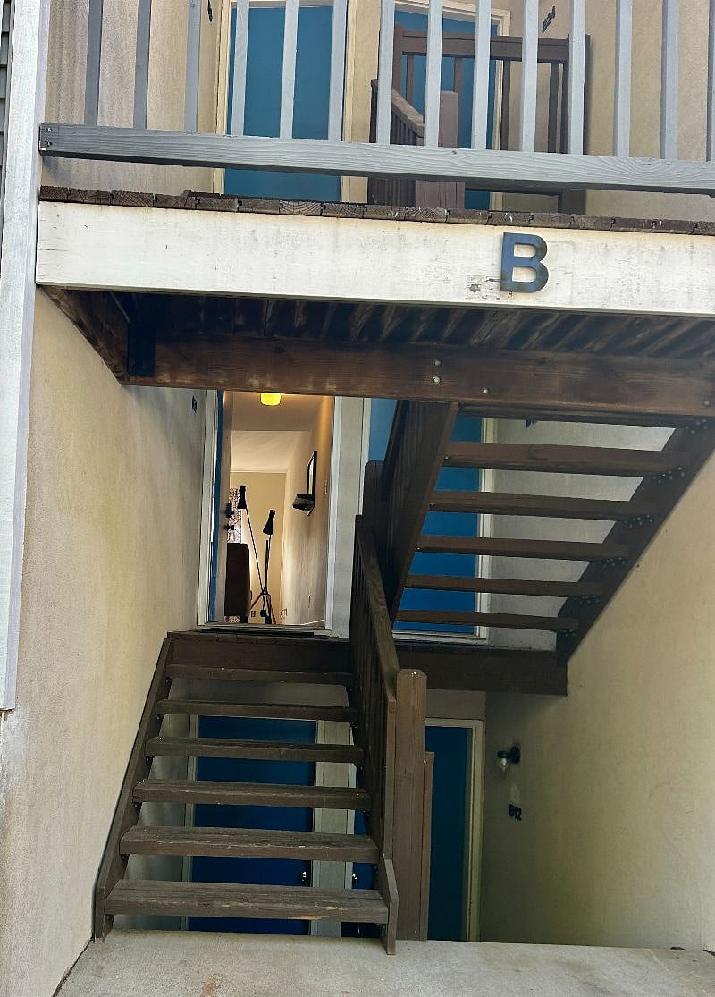 Half a flight of stairs up the condo