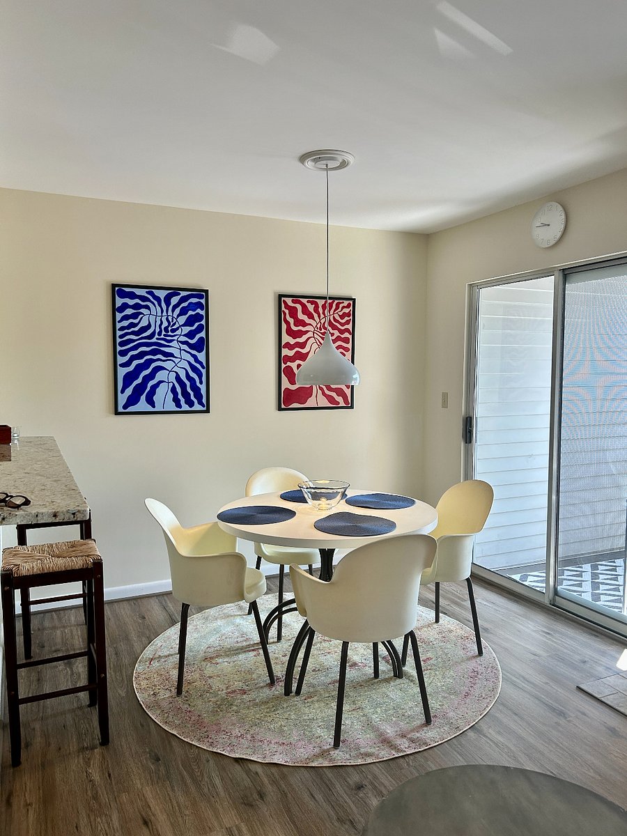 Dinning area with bar and stools off the balcony