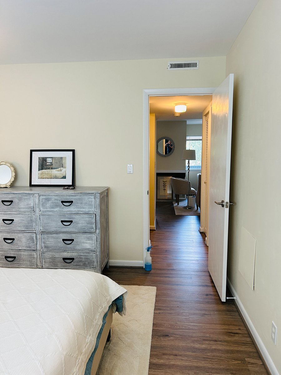 Bedroom dresser with queen bed and all the lines
