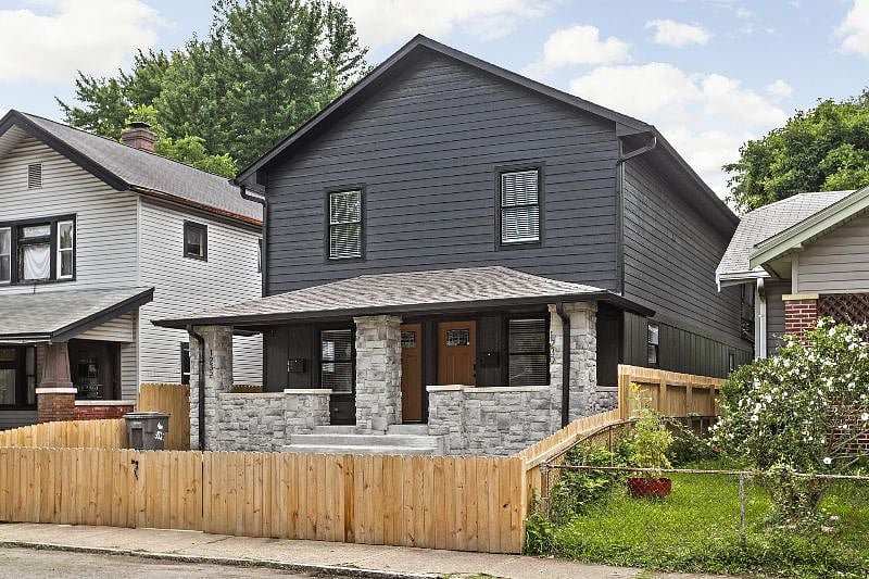 The exterior of the home, also fenced for added privacy and security.