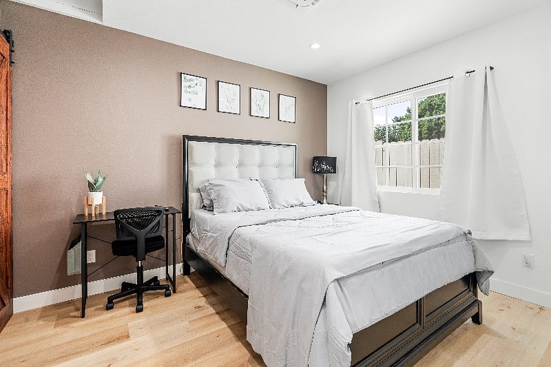Rest comfortably on this queen size bed with the sound of rain, the ocean, forest, and more (noise machine)