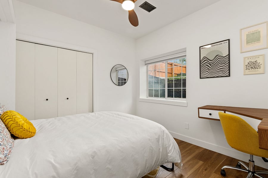 Second bedroom features a murphy bed -pictured down