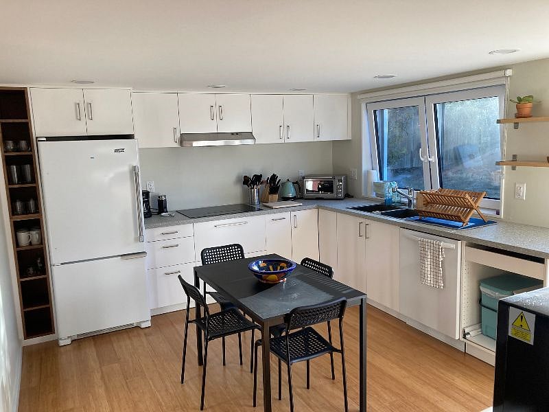 Almost full kitchen. There isn't an oven but a high quality convection toaster oven that fits an entire pie pan and an air fryer.
