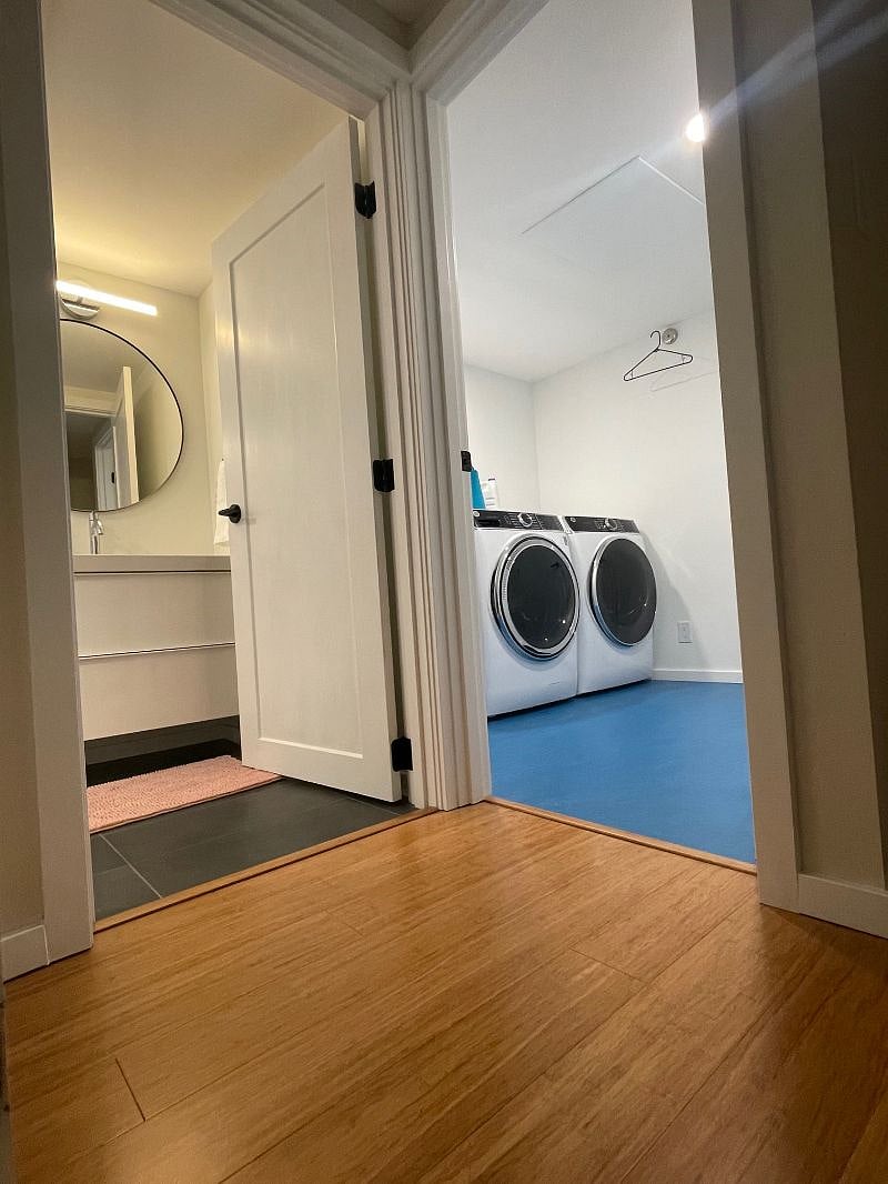 Shared laundry room. Doors to laundry room lock for each side.