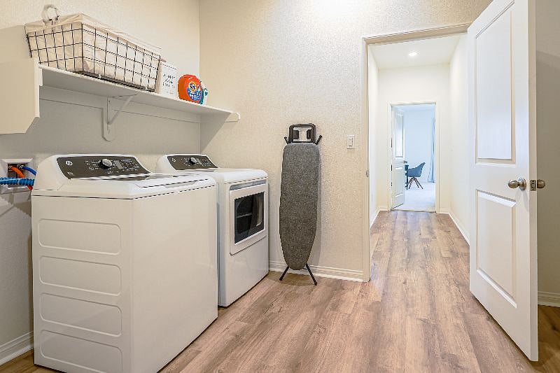 Starter laundry and cleaning supplies provided.
