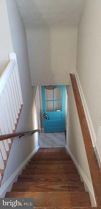 Private interior staircase takes you to your upstairs apartment.