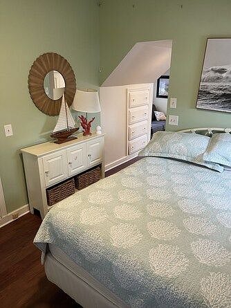 Master bedroom with full sized pull out and private balcony.