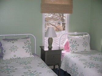 Two twin beds in extra bedroom.